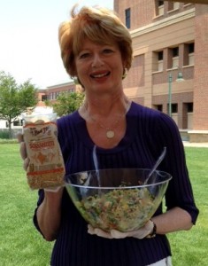 BRMLesDamesSorghumAug2013 Carol Fenster with sorghum salad.